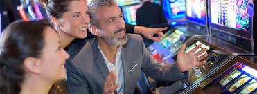 Multilingual live dealer broadcast with Indonesian, English, and Mandarin language options on dotabet66